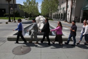 Join your coworkers for a brisk walk.